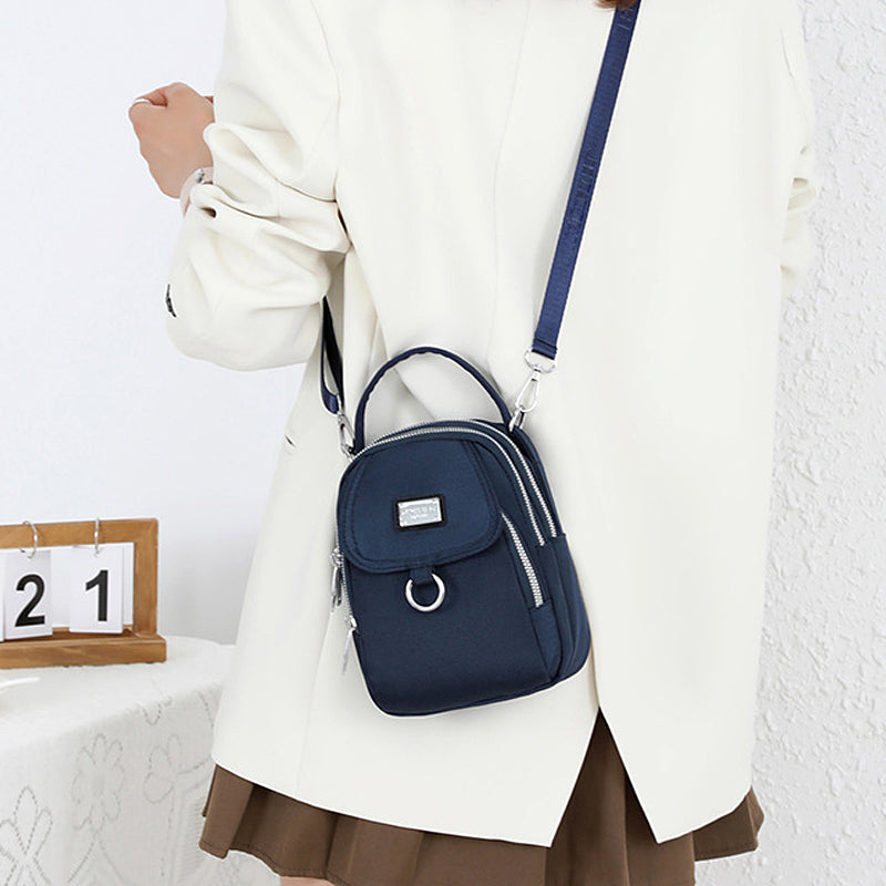 Water-Resistant Crossbody Phone Bag with Multiple Pockets and Adjustable Strap