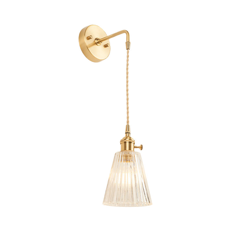 Avtoit | A wall light with a bulb and conical shade made of clear, textured glass, industrial bedroom wall light fixture