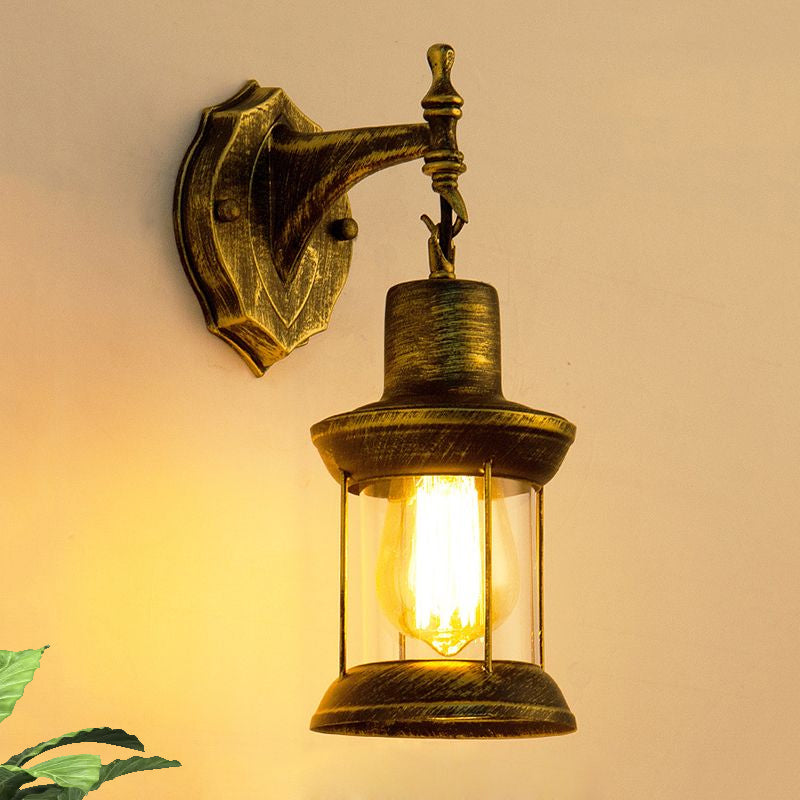 Avtoit | An E27 wall light with a petroleum shade made of clear glass Traditional outdoor wall light in antique bronze