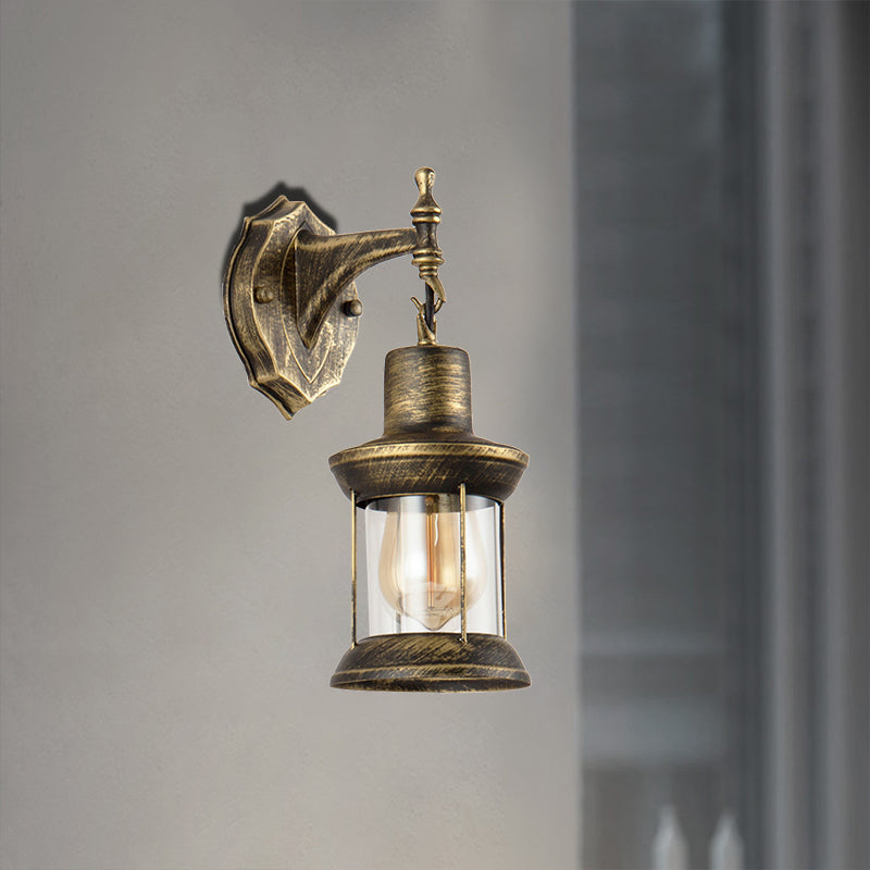 Avtoit | An E27 wall light with a petroleum shade made of clear glass Traditional outdoor wall light in antique bronze
