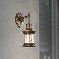 Avtoit | An E27 wall light with a petroleum shade made of clear glass Traditional outdoor wall light in antique bronze