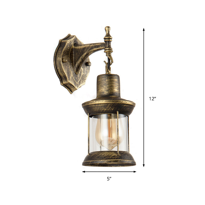 Avtoit | An E27 wall light with a petroleum shade made of clear glass Traditional outdoor wall light in antique bronze