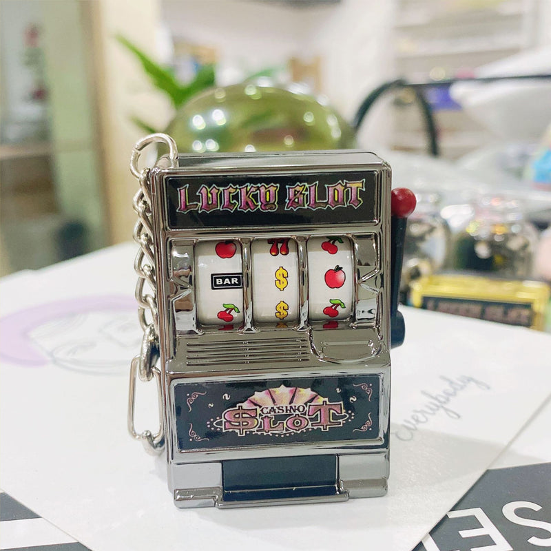 Avtoit | Keychain designed as a slot machine