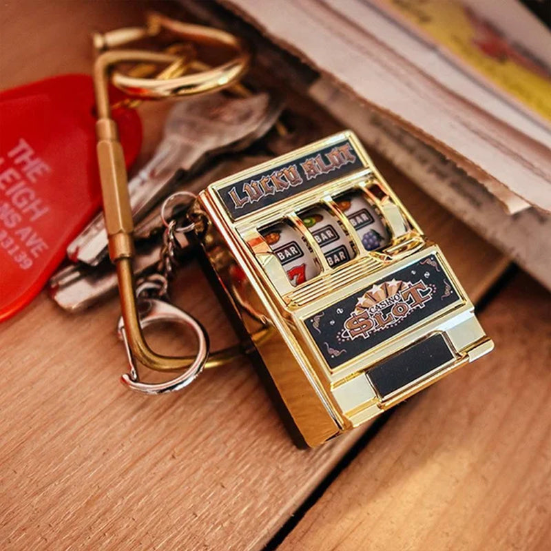 Avtoit | Keychain designed as a slot machine