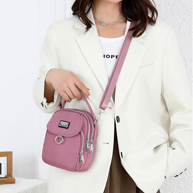 Water-Resistant Crossbody Phone Bag with Multiple Pockets and Adjustable Strap