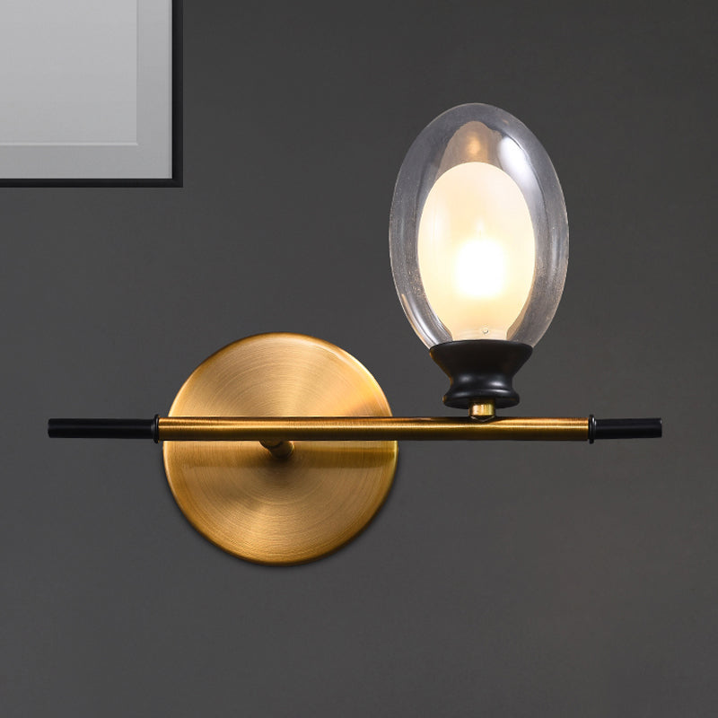 Avtoit | Clear/Amber Glass Egg Shape Wall Light Minimalist 1 Light Brass Wall Lamp with Horizontal Arm