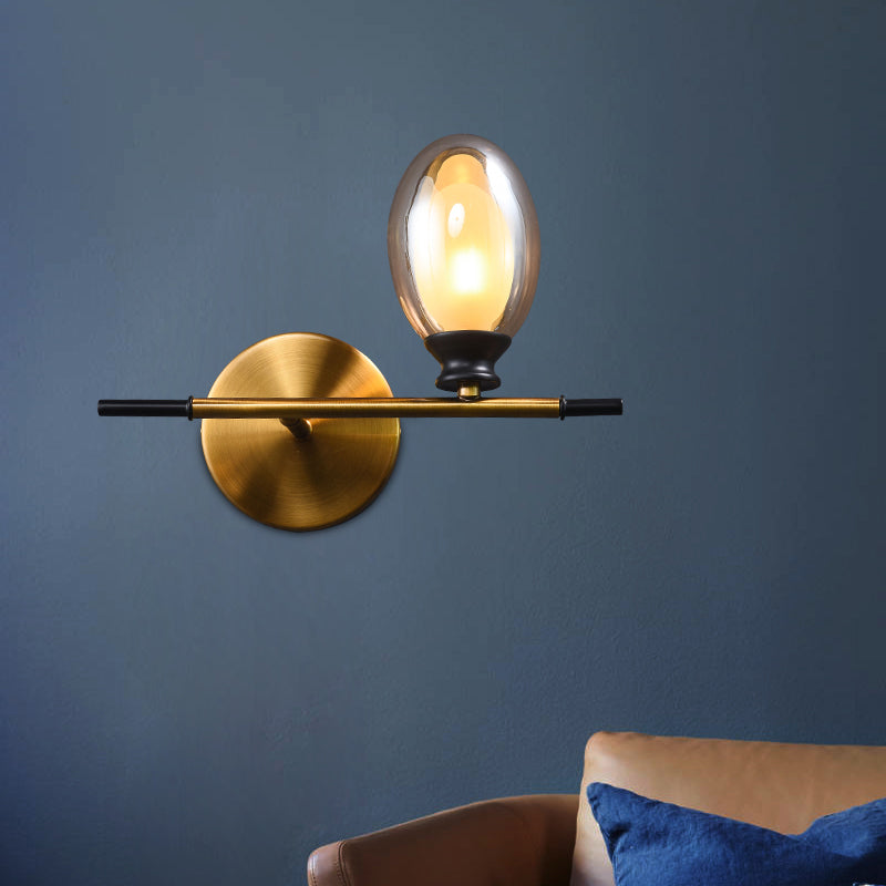Avtoit | Clear/Amber Glass Egg Shape Wall Light Minimalist 1 Light Brass Wall Lamp with Horizontal Arm