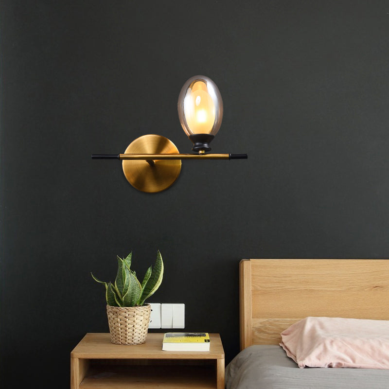 Avtoit | Clear/Amber Glass Egg Shape Wall Light Minimalist 1 Light Brass Wall Lamp with Horizontal Arm