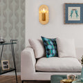 Avtoit | 1 Head Exposed Bulb Wall Mount Lamp with Oval Metal Back Plate Postmodern Wall Lighting in Gold