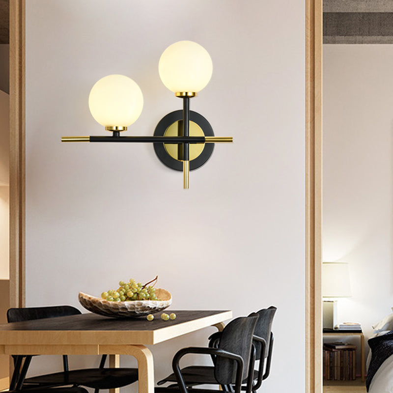 Avtoit | Milk glass orb wall light with cross design 2 lights modern black and brass wall light