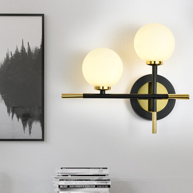 Avtoit | Milk glass orb wall light with cross design 2 lights modern black and brass wall light