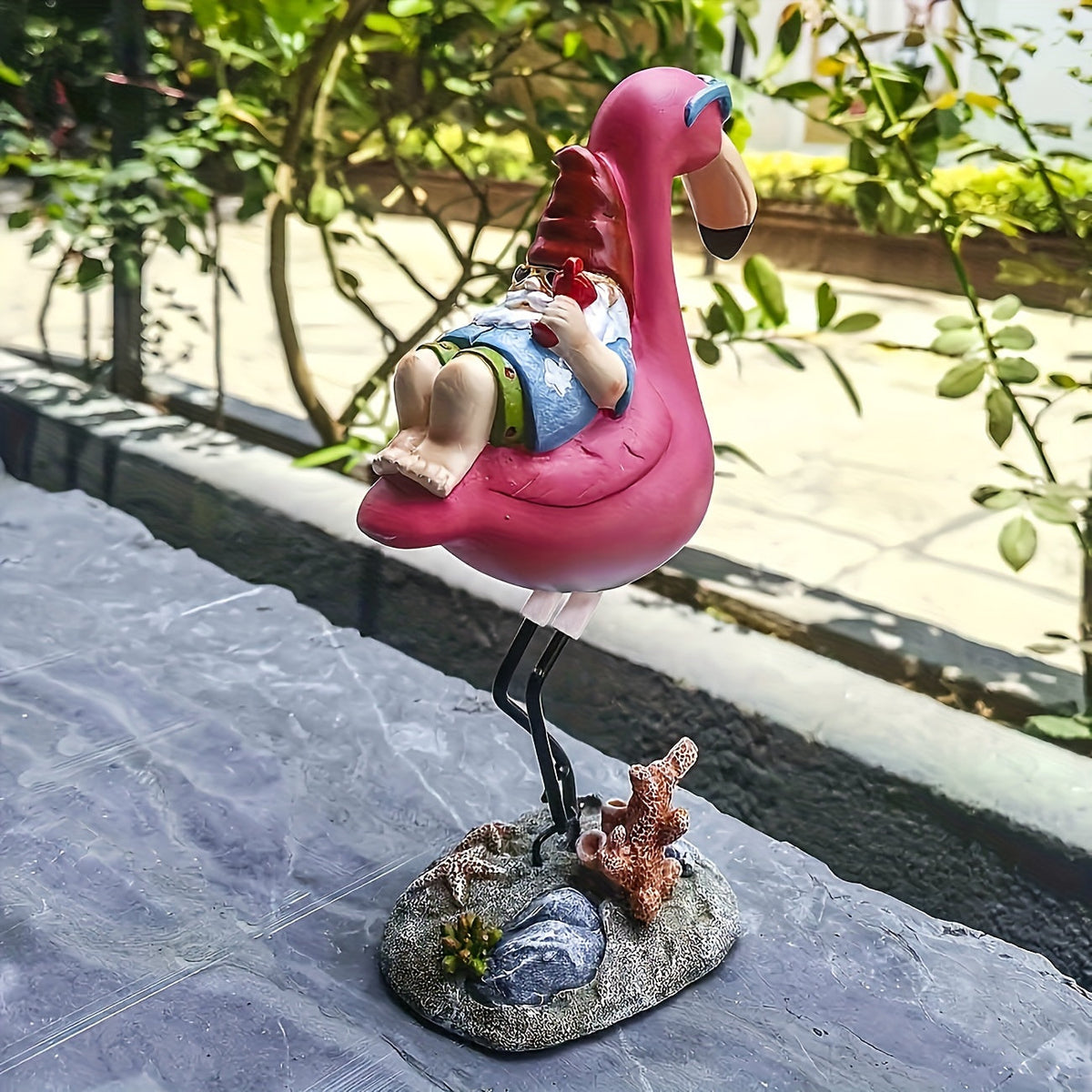 Avtoit | Flamingo relaxing garden gnome statue