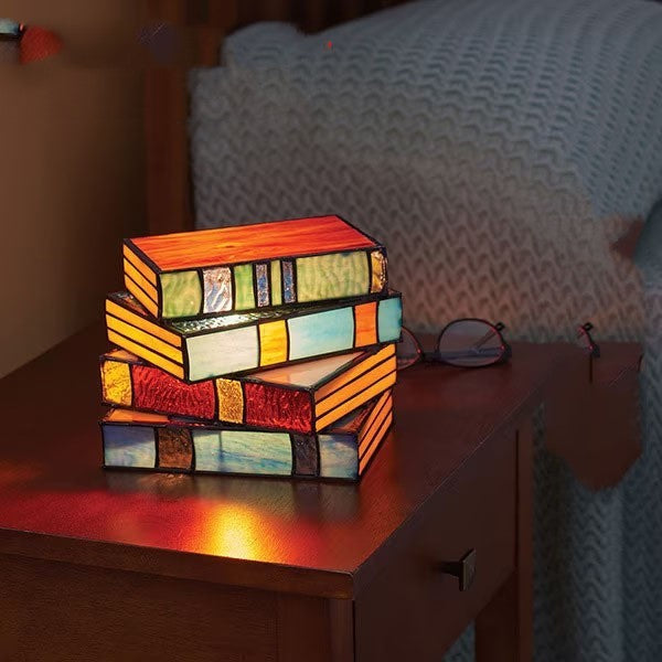Avtoit | Desk lamp with stacked books