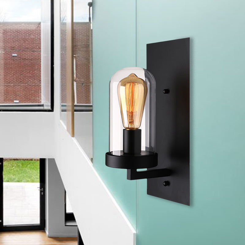 Avtoit | A wall lamp with a capsule shade made of clear glass, industrial living room wall lighting in black