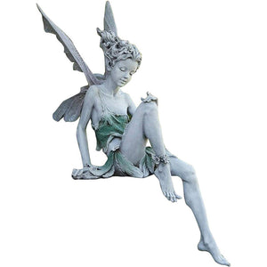 Avtoit | Statue of sitting fairy in the garden