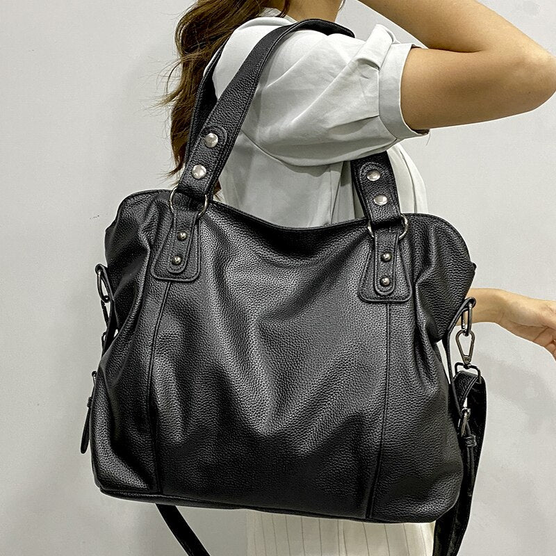 Avtoit | Retro-inspired tote bag with smooth faux leather and classic seam detailing