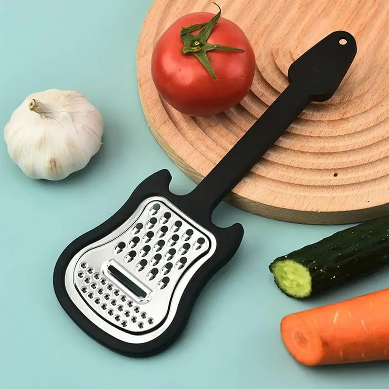 Avtoit | Vegetable peeler made of stainless steel – Guitar-shaped peeler for peeling & slicing