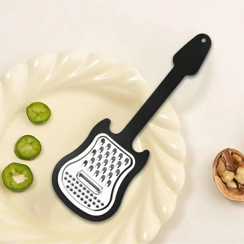 Avtoit | Vegetable peeler made of stainless steel – Guitar-shaped peeler for peeling & slicing