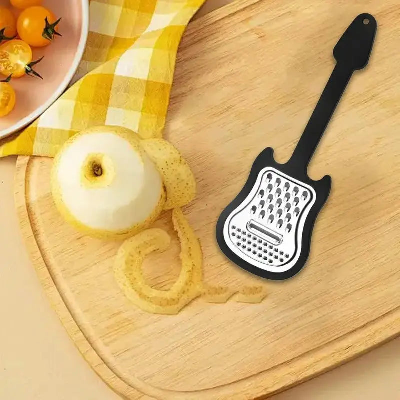 Avtoit | Vegetable peeler made of stainless steel – Guitar-shaped peeler for peeling & slicing