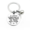 Avtoit | A sister is God's way of making sure we never walk alone keychain