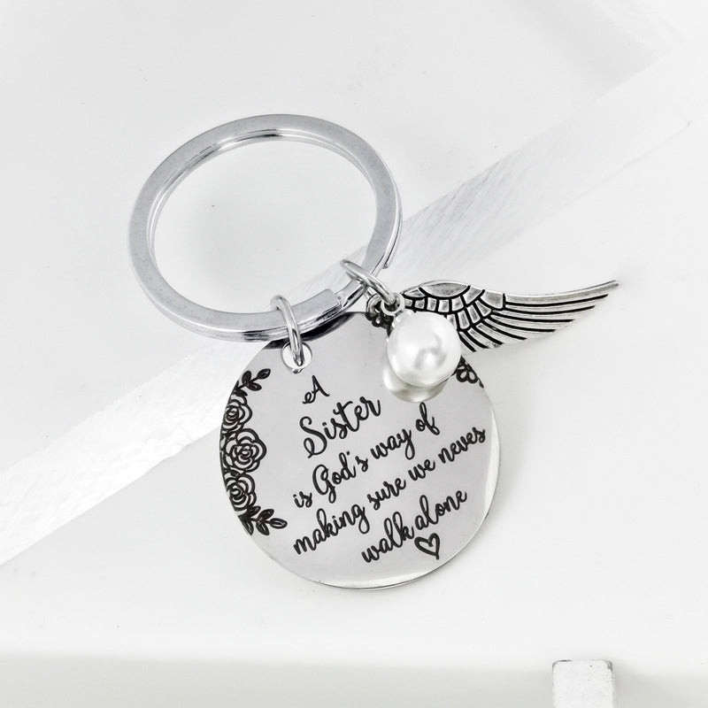 Avtoit | A sister is God's way of making sure we never walk alone keychain