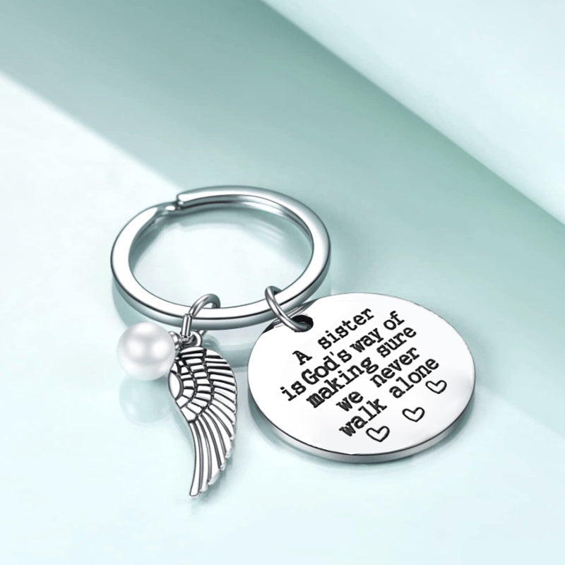 Avtoit | A sister is God's way of making sure we never walk alone keychain