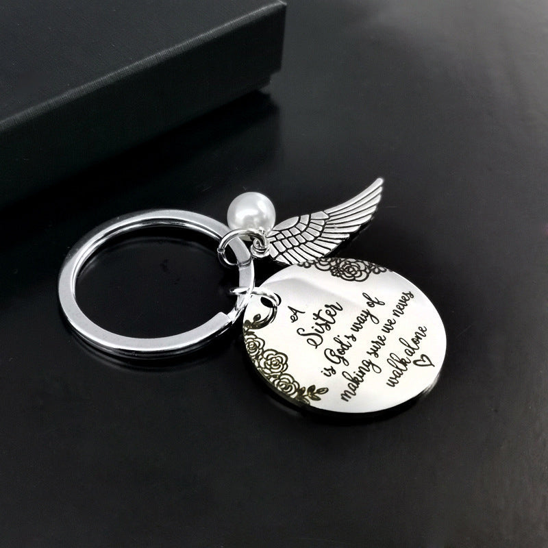 Avtoit | A sister is God's way of making sure we never walk alone keychain