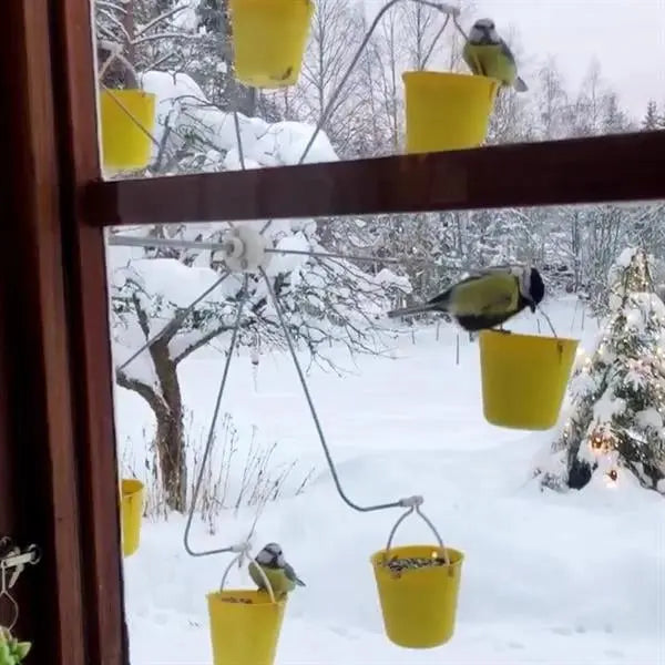 Avtoit | Bird feeder station in ferris wheel design