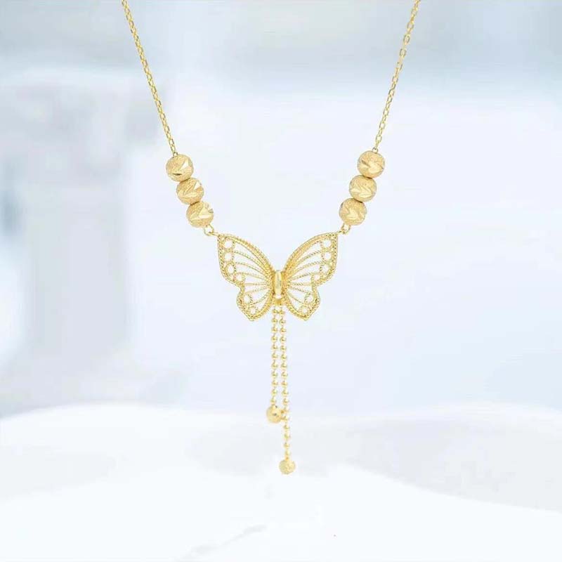 Avtoit | Necklace with gold-colored butterfly with tassels