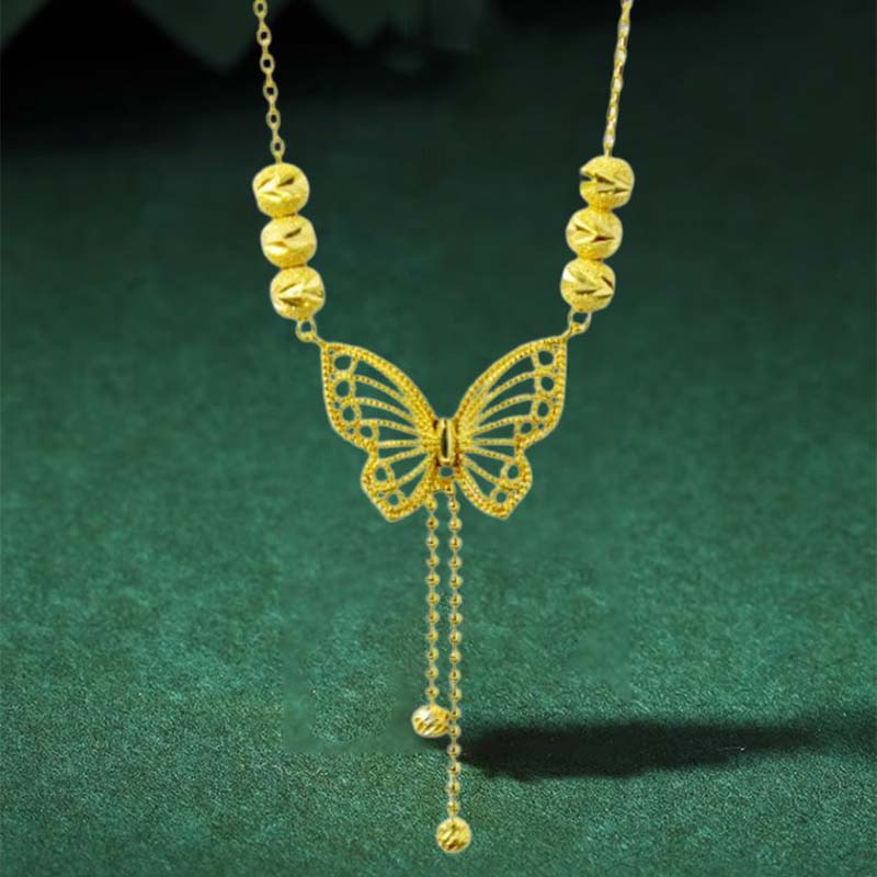 Avtoit | Necklace with gold-colored butterfly with tassels