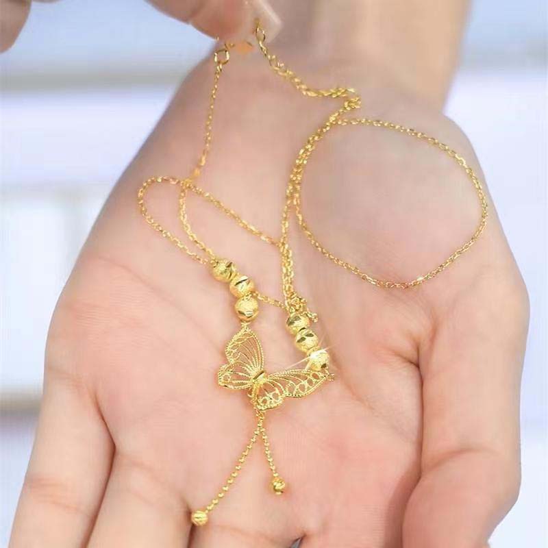 Avtoit | Necklace with gold-colored butterfly with tassels