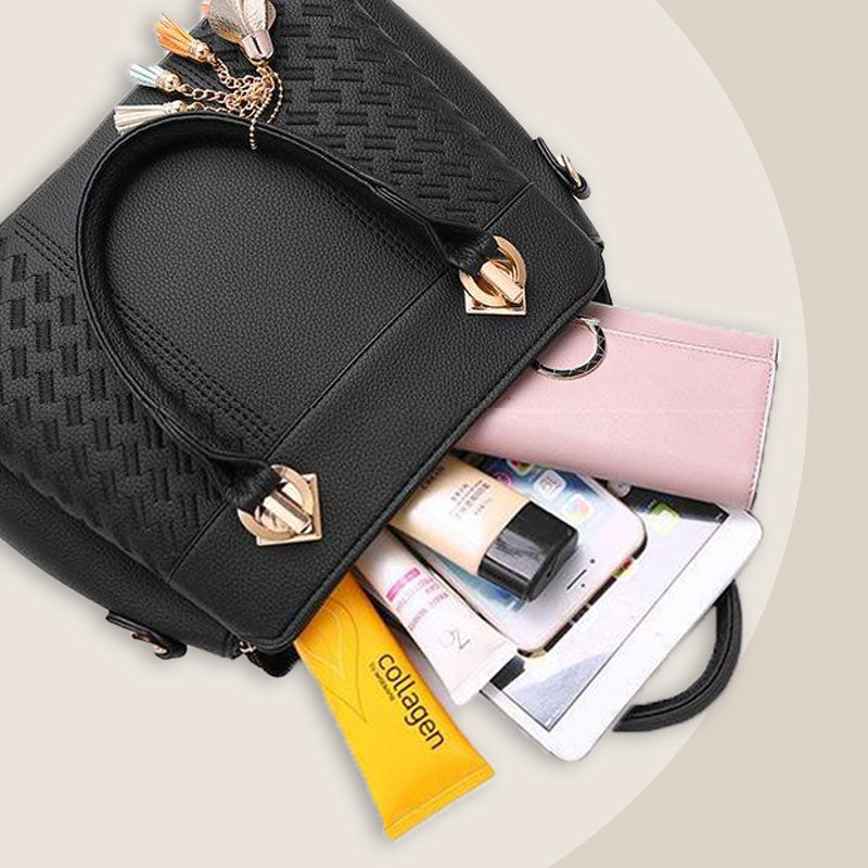Avtoit | Elegant women's bag with tassel pendant
