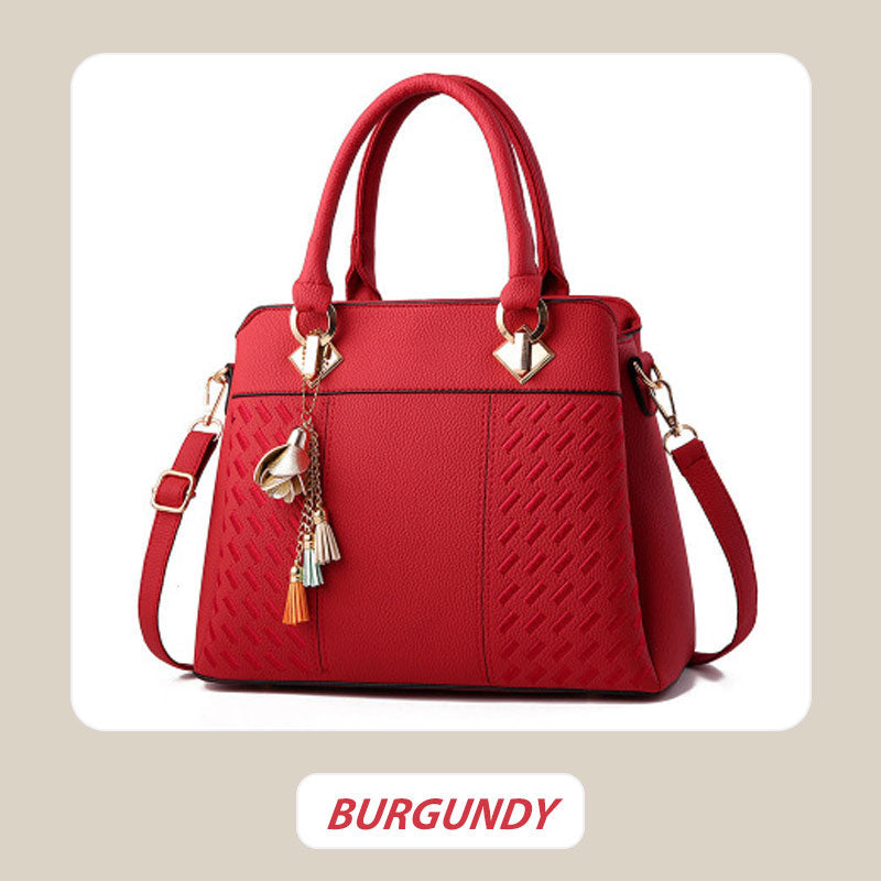 Avtoit | Elegant women's bag with tassel pendant