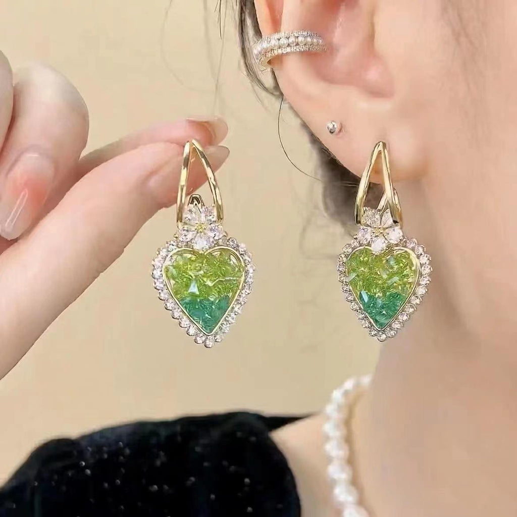 Avtoit | Earrings with heart in green crystals
